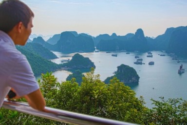 Halong Bay - Titov Island – Hanoi (B, Br)